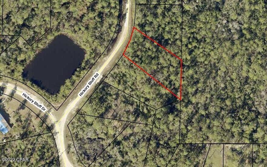 Hickory Bluff, named for the tress and high and dry land, here is a building lot, ready for a new construction or mobile home. Surrounded by new homes and a short distance to Fanning Bayou, fishing, boat ramp and just a few miles from Lynn Haven. The lot has with no association fees so bring your boat, RV, build a pole bar or workshop. Peaceful, quiet and ready to go today! Lot next door is for sale as well or choose from any of the 50 lots we have for sale in Hickory Bluff community! Call for additional details.