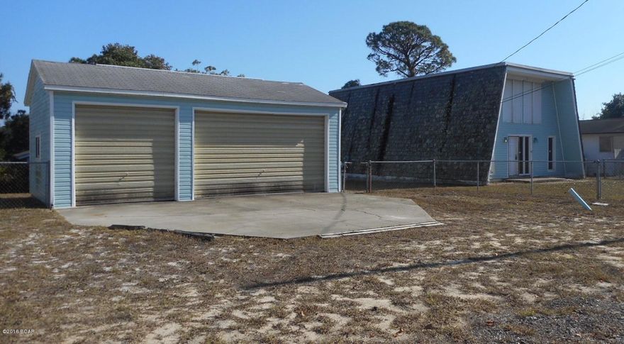 A frame cottage, Located within a few blocks to the sandy white beaches, close to Hwy 79, restaurants and shopping, plus, this home has a 3 car garage.  It needs some work, but houses in this price range are rarely available on the South side of Panama City Beach Parkway. Downstairs is a living room/dining room, kitchen, den, laundry, bath and bedroom.  Upstairs are 2 more bedrooms (one is loft) and a full bath. Make an appointment to see this one today.