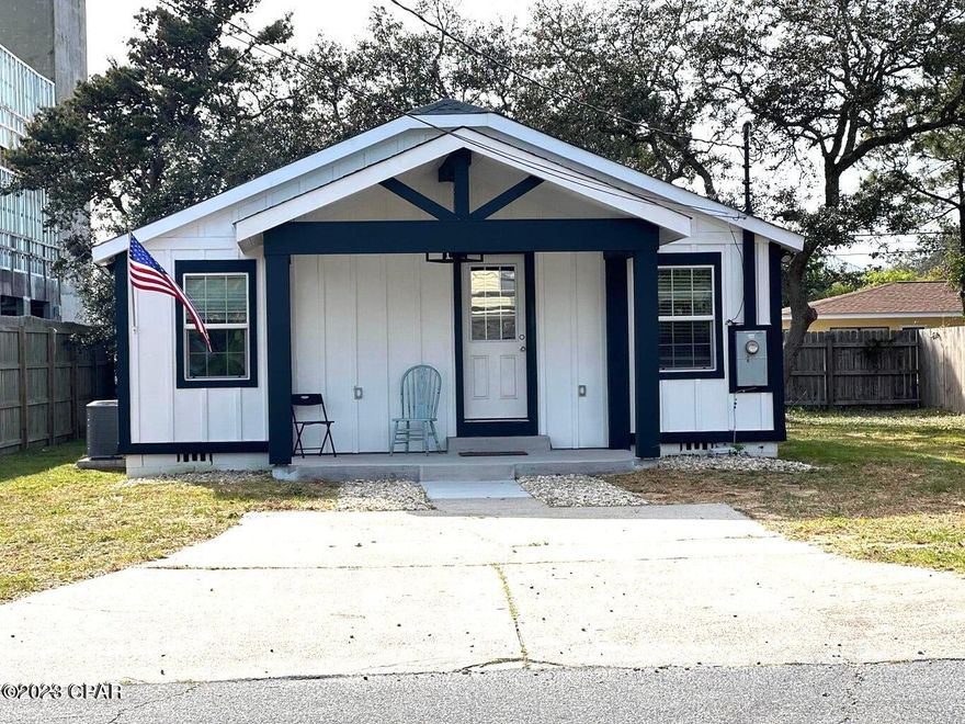 location location location!! This Florida Cottage very close to the Beach, and is a great investment for vacation rental and it is projected to make average gross income around $65K. house has been fully renovated with new kitchen, new floor and new porch as well. Fully Furnished, and it is ready to make money is a turn key. the house is located Between Front Beach Road and Hutchison Beach Road, 1 mile to per park, and 2 miles to Thomas Dr where all the attractions is. Perfect for permanent home or rental. it is Zoned  CH!!