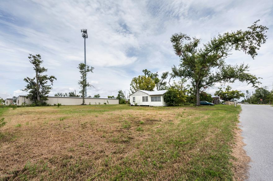 **55K PRICE IMPROVEMENT FROM ORIGINAL PRICE!!! This is a GREAT opportunity for investors!  This mixed use zoning means it can be subdivided into 3 lots for 3 individual homes, duplexes, offices, retail, restaurant, beauty shops/doc offices and various professional establishments, auto repair, car wash, daycares/preschools are just some of the potential things that can be done with this property.  This property is very close to Hwy 77.  According to 2019 FL DOT Traffic Data, this area of Hwy 77 receives roughly 34,000 cars passing through every day.  Newer water heater and metal roof on home.