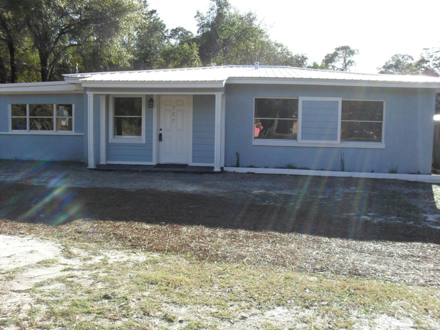 Newly renovated 3 bedroom 1 bath home.  This home also has a new metal roof, new HVAC, new hot water heater, new wood flooring, stainless steel appliances, new kitchen cabinets with granite countertops!  Bathroom has a new toilet, shower and vanity. New plumbing fixtures, lighting fixtures, new interior door(s) and front door.  Freshly painted throughout. All this on a large lot with a privacy fenced in back yard.  At this price, this home won't last long!