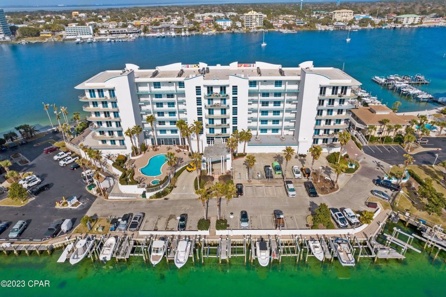 THIS IS AN OPPORTUNITY YOU DO NOT WANT TO MISS! This Beautifully Updated 2 Bed, 2 Bath Waterfront Residence Comes With Private Boat Slip, Climate Controlled Storage & Oversized Private Garage! Features Include: Open Floor Plan, 10 ft Ceilings , Updated Flooring, Newly Painted, Updated Bathrooms, Quartz Countertops, Updated Kitchen With New Stainless Steel Appliances, Backsplash, Shiplap, New Wet Bar With Wine Fridge, Expansive Balcony With Gorgeous Panoramic Views of The Gulf of Mexico & Destin Harbor! New HVAC & New H2O Tank 2021! Located in Harbor Lights, One of Destin's

Premiere Buildings! A Gated, Low Density Condominium That Prohibits Short-Term Rentals! Amenities Include: Common Area, Paddle Board Storage, Owner's Only Beach Access, Conference Room & Beautiful Pool & Hot Tub! Harbor Lights Features Only 39 Units And Offers A Private & Luxurious Lifestyle. It Offers Amazing Amenities Such As Pool, Hot Tub, Gym/Fitness, Sauna/Steam Room, Owner's Private Common Area/Lounge, Private Dog Park & Floating Dock. The Lounge Features Its Own Kitchen And Makes For A Fabulous Gathering Spot. Beat The Traffic And Take Your Boat Or Water Taxi to Harborwalk For Some Of The Best Shopping, Dining & Hangout Spots That The Emerald Coast Is Known For! Schedule Your Private Showing Today!!