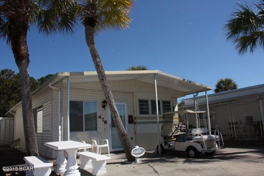 Incredible opportunity to own a great property in Venture Out. This home backs up to St. Andrews State Park making the location amazing. This home has a great rental history and would be a perfect second home or investment opportunity.  Venture Out has 300' on the beautiful pristine beaches of the Gulf of Mexico and 1,000' on the Grand Lagoon. Venture Out has something for everyone!