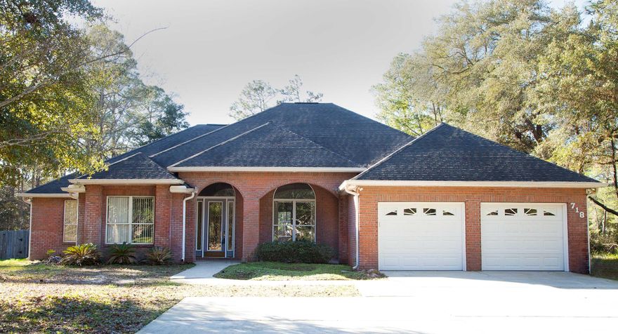 Exquisite custom built brick home featuring 10 to 12 ft ceilings and recently updated with new flooring and, a neutral interior paint. The great room has a gas fireplace surrounded with built in's for a TV. A gorgeous kitchen with cherry cabinets and granite counter tops. In the den you will find a cherry paneled accent wall, carpet accented by a marble border. The master suite has a spacious separate shower, Jacuzzi tub, double vanity with a corian counter and a large walk in closet. Enjoy the privacy of a large fenced in back yard while you lounge around the screened inground heated pool and spa.