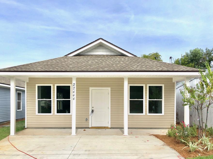 UNDER CONTRACT, ACCEPTING BACKUP. New Home Under $250,000! WOW! Enjoy an easy stroll or golf cart ride to Lake Powell or to the beach!  Exterior features include a relaxing porch, complete landscaping package, wonderful curb appeal and CHECK OUT THE SIZE OF YOUR BACK YARD! Fall in love with the coastal feel inside. Comfortable open floor plan, granite tops, beautiful lighting, white cabinets, and pretty plank tile! Even the baths offer a custom feel! Builder provides a 10 year warranty. You'll love everything about this affordable new beach home! Not very often you'll see a value like this! If you want to live or invest in a beach home, this is it! Call your favorite realtor today!