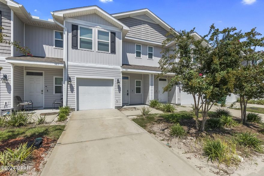 Take a look at this spacious 3-bedroom, 2.5-bathroom townhome located in the heart of Panama City, FL. This modern unit features LVP wood flooring throughout the living areas, with plush carpeting in the bedrooms for added comfort. Enjoy the convenience of a 1 car garage for parking and storage. Take a dip in the community pool or explore the nearby shopping and dining options just a stone's throw away. Don't miss out on this fantastic opportunity to live in a prime location.