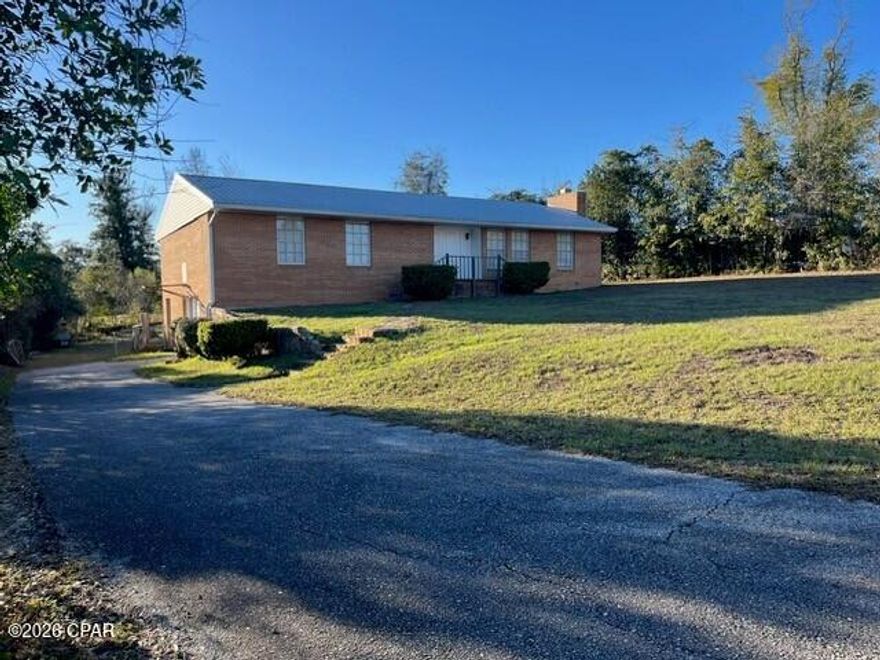 If you've been searching for a solid home in an established, centrally located neighborhood, this is the one. Nestled in the heart of Marianna, this timeless property offers the perfect balance of small-town charm and everyday convenience. Enjoy the benefit of being just about an hour's drive from Tallahassee, Dothan, and Panama City--making commuting, shopping, dining, and beach trips easily accessible.

Step outside to a spacious, fenced backyard where kids and pets can play freely and safely.

Inside, you'll find a flexible floor plan designed for comfortable living. With both a welcoming living room and a separate den, there's plenty of room to gather, entertain, or simply spread out. The generous basement adds even more versatility--perfect for a home office, gym, game room, hobby space, or additional storage.

While the bathrooms and rear deck offer an opportunity for updates and personalization, the home is otherwise in great condition and full of potential. Whether you're a first-time buyer, growing family, or someone looking to invest in a well-built home with room to make it your own, this property is a fantastic opportunity.