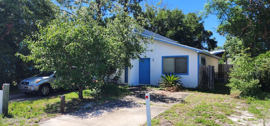 Duplex located south of Grand Lagoon, each side is a 1bdr/1bth 608 sq feet. Excellent opportunity to live in one side while renting out the other or for an investor looking for a property to renovate and rent out. Short term rentals are allowed. Boat ramp is only 2 short blocks away and a short golf cart ride to the beach. Take advantage of this property listed under market value to take into account for updates. Located in Flood Zone X.