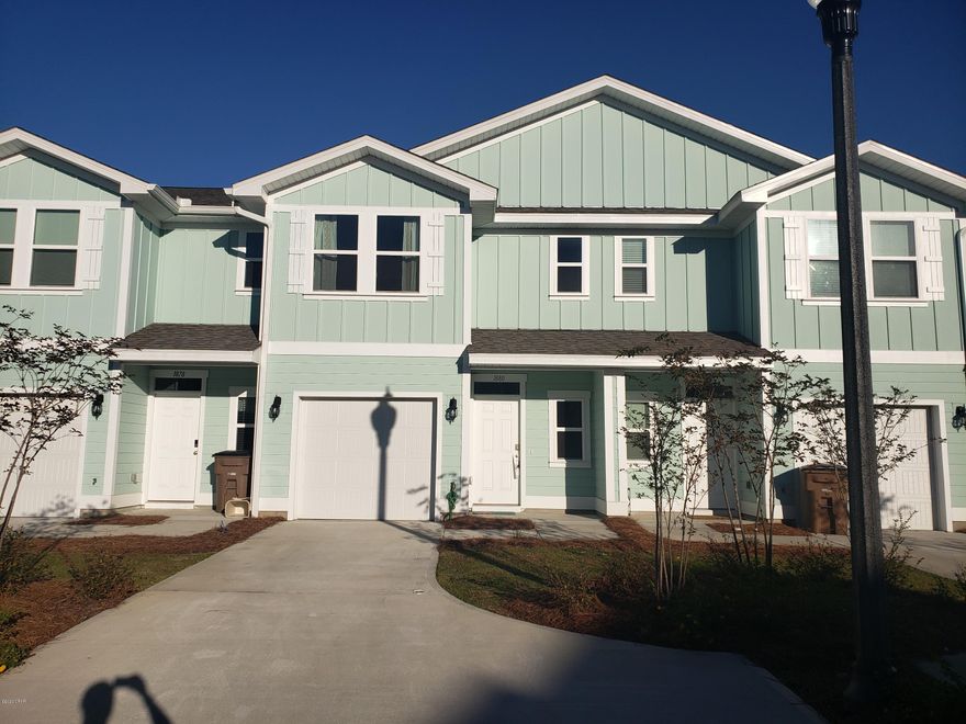 Community Pool!  3 bed, 2 and 1/2 bath in Hathaway Townhomes. Upon entering you will find the kitchen with all stainless steel appliances and granite counter tops, spacious living room and breakfast nook, half bath, and one car garage on the bottom floor. On the top floor you have your large master bedroom with walk in closet, and master bath with double vanity sink along with the other two nice size bedrooms and the second full bath. The back of the home includes a patio large enough for a grill and chairs. Home includes a Smart Home. Pets may be considered. *The  home is NOT furnished. 17 miles to Tyndall, 3 miles to Navy Base, 17 miles to Rosemary Beach, 16 miles to Inlet Beach, 16 miles to 30A, 8 miles to Pier Park, 10 miles to Lynn Haven. New construction. Available for move in NOW!!!
