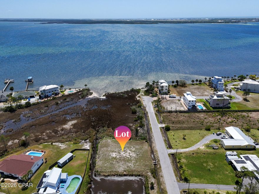 Build your Elevated dream home on this exceptional water-view vacant lot overlooking the Bay in Callaway, Florida! Ideally located just one block from the water, this prime homesite offers stunning views and refreshing coastal breezes year-round. With all utilities conveniently available at the street, this property is perfectly suited for an easy and efficient build.

Enjoy the best of coastal living with close proximity to Tyndall Air Force Base, as well as the sugar-white sands of Mexico Beach and Panama City Beach. The area features highly regarded schools, abundant dining options, and outdoor recreation including parks, disc golf, and world-class fishing in the Gulf.

With no restrictions on vacation rentals, this property offers excellent potential as a primary residence, second home, or income-producing investment. Don't miss this opportunity to own a slice of Florida's Gulf Coast in a rapidly growing and desirable location.

Bring your plans and start building your coastal dream today!