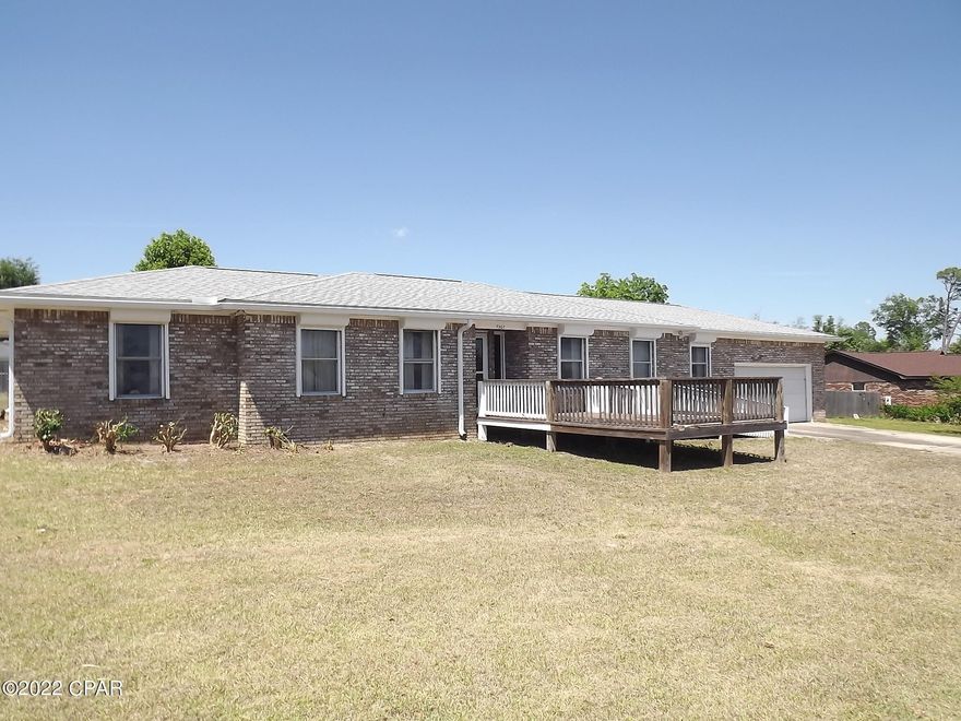 PROPERTY IS UNDER CONTRACT-SELLER IS ACCEPTING BACK UP OFFERS Beautiful property on a large fenced lot.  This home does need some updating but is livable with ample space for a growing family.  It is in close proximity to shopping, Tyndall AFB and a number of water related activities.  The yard is very large and offers room for a Pole Barn or a Pool if desired.  There is a Ramp and Front deck that can be used or removed, that would be the Buyers choice. If you are looking for the home with endless possibilities this is it and is priced to sell.