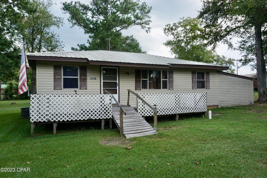 Two bedroom, one bath home with LOTS of space! This conveniently located home features a large living room and additional room that can be used for a home office, additional bedroom, or whatever space your family needs! There is a dedicated dining room off of the kitchen and a HUGE bonus entertaining space that is perfect for a pool table, hangout spot, or additional living space. Home is situated on a large, in-town lot that is conveniently located minutes to Sneads Park at Lake Seminole, the Adam Tucker Wilson Recreational Park, and great local schools! The lot also comes with a storage shed and extra-tall carport, perfect for boat or RV storage. The home is being sold with all standard kitchen appliances (including dishwasher), microwave, washer and dryer. Sneads is a short, 20-minute drive to Marianna and is just 50 minutes from Tallahassee via I-10. Be sure to check this home out soon!