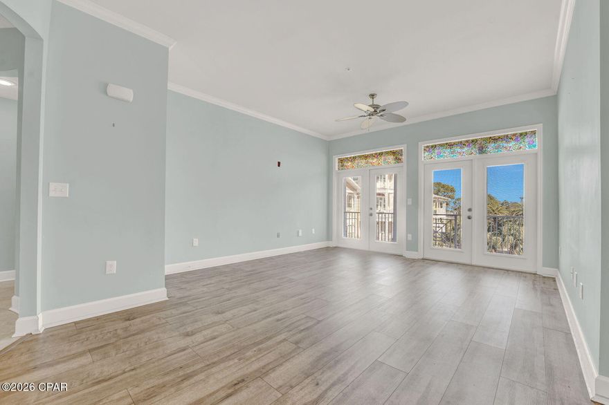 Welcome to Unit 1302 at Island Reserve, a beautifully updated courtyard facing end unit in this gated, resort-style community in the heart of Panama City Beach. Perfectly positioned on the third floor, this 2 bedroom, 2.5 bath condo offers one of the most desirable views in the community, overlooking the lush, landscaped courtyard known for its peaceful, private setting. As an end unit located just steps from the parking garage, convenience is unmatched. Recent community upgrades include brand new exterior paint and a newly covered balcony, and HOA dues now include internet, adding even more value. Priced to sell and offering location, privacy, and ease, this is a standout opportunity at Island Reserve.

Inside, you'll find new luxury vinyl plank flooring throughout along with a newly installed walk-in tub for added comfort and accessibility. Both bedrooms are spacious private suites with their own private bathrooms and walk-in closets. Additional highlights include a full-size washer and dryer, new energy efficient HVAC and water heater installed in 2022, and convenient access from the attached parking garage. The unit is being sold unfurnished, offering a blank canvas to make it your own.

Residents enjoy resort style amenities including a zero entry pool with waterfalls, hot tub, fitness center, basketball and pickleball courts, game room, and private theater. The pet-friendly community allows up to two pets under 40 lbs and is just a short golf cart ride to the beach, shopping, dining, and entertainment. With short term rentals not permitted, this condo is ideal for full time living or a long term investment opportunity.