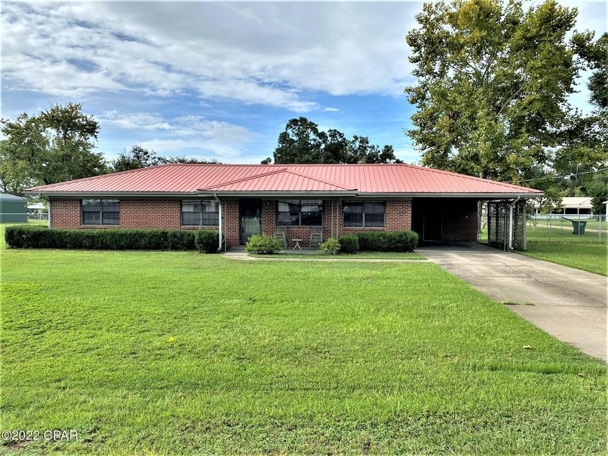 CURRENTLY UNDER CONTRACT, SELLER WILL CONSIDER BACKUP OFFERS! MOVE IN READY!! Completely furnished, (excluding tools in workshop) immaculate home. Sitting in a quiet neighborhood with a huge recreational park 1/2 a block away, grocery store and shopping one block away! Boat landing less than a mile away on Lake Seminole. This house has been impeccably taken care of as well as the yard. Fenced back yard with a 26 x18 pole barn (with electric), 20 x 17 work shop with AC, 12 x 9 smaller shop with AC.  Two Bay carport attached to workshop and one car attached to the home. Located in a class A school zone. Completely fenced back yard. Central Unit is 6 months old and metal roof is 5 years old. Pre-approved buyers only.