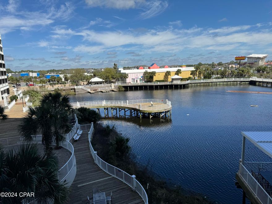 MOTIVATED SELLER, MAKE A OFFER, Fully  Furnished. GREAT VIEWS & NO ELEVATOR. GULF VIEW FROM 2nd BEDROOM AND BUNK ROOM. $1,000 Dollar credit for Barn Door to close off Bunks. Park on 2nd floor walk straight to Condo. This Condo has 2 Bedrooms, 2 Baths, Bunk Room & Can Easily Accommodate Over 8 People. Large Open Floor Plan, Large Balcony, Granite Countertops, Master Suite with Double Vanity, Garden Tub & Separate Shower. Updates Include: updated Stainless Appliances, New Lighting, Newer Furniture., AC and Water Heater.   All The Fun & Excitement PCB Has to Offer. Just Steps Away from the World's Most Beautiful White-Sand Beaches, Shopping, Dining & Entertainment! This Beachside Resort Offers Unparalleled Amenities With 5 Unique Pools, Splash Bar & Grill, Gulf View Fitness Center & Covered Garage Parking, Several Restaurants On-Site & Coffee Bar. Enjoy The Nightly Fountain & Light Show & Market Shops.