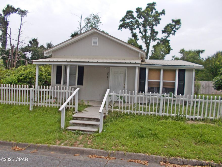 Cute little starter home or home for your retirement, in town city street corner lot, light fixtures and ceiling fans are less than a year old, privacy fencing on side and back yard, new hot water heater. The title company has a survey on it.