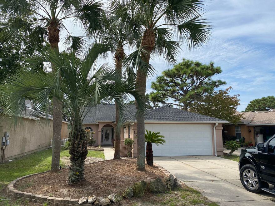 CURRENTLY UNDER CONTRACT, SELLER ACCEPTING BACKUP OFFERS Patio home located on a quiet cul de sac less than a mile from the sandy white beaches. This is a lovely home with a split floor plan centrally located in Panama City Beach,  just a few miles from Pier Park on one side and St. Andrews State Park on the other. You can enjoy the outdoors without getting wet on rainy days in your covered/screened sun-room and still have plenty of yard for a hammock and grill. This home was re-piped so no threat remains from the faulty piping that many of these home initially had, current roof installed in 2015 with dimensional shingle and skylights were replaced, some minor repairs performed post hurricane Michael, new air conditioning system installed in 2016, new automatic garage door. The house has been freshly painted inside with a bright neutral look. Carpet is new.