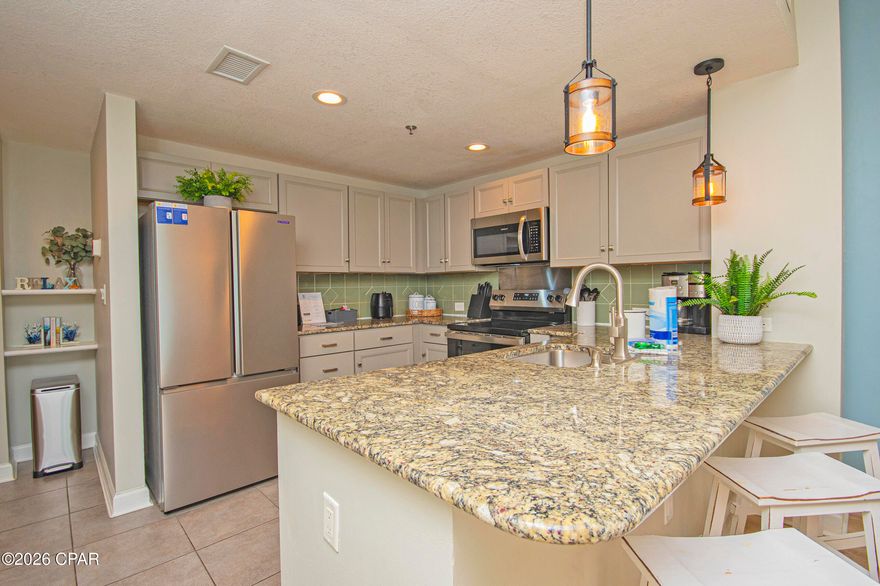 Wake up to the sound of waves and endless Gulf views from this stunning 20th-floor retreat at 11807 Front Beach Rd #2003 in Panama City Beach.
From the moment you step inside, the emerald water commands your attention. Floor-to-ceiling glass draws the horizon into your living space, filling the condo with natural light and the calming rhythm of the coast. Whether you're savoring your morning coffee on the private balcony or unwinding at sunset as the sky turns shades of pink and gold, every day here feels like a vacation. The open-concept living and dining area is designed for connection -- laughter over seafood dinners, movie nights after long beach days, and effortless entertaining with the Gulf as your backdrop. The spacious primary suite offers a peaceful escape, where you can drift to sleep with the shimmer of moonlight on the water just beyond your window. Located directly on the sugar-white sands, this residence offers immediate access to the beach -- no streets to cross, no hassle -- just toes in the sand within moments. Resort-style amenities elevate the experience, creating a lifestyle that blends relaxation and recreation seamlessly. Whether you're searching for a personal coastal sanctuary, a smart investment opportunity, or both, this is more than a condo -- it's a front-row seat to the Gulf, a place where memories are made, and where life slows down just enough for you to truly enjoy it.
Your beachfront story begins here.