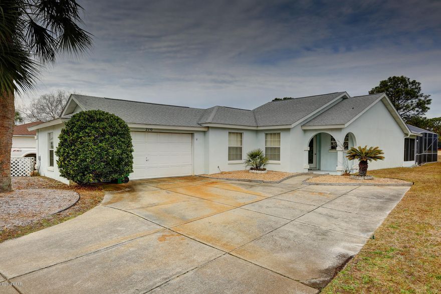 HOMBRE GOLF COURSE PATIO HOME within walking distance to the beach! Enclosed pool, open floor plan, vaulted ceiling, h/c florida room! Lots of skylights bring natural light in throughout the hm. Enter the MBR thru dbl doors, there is sliding door access to the pool. MBA has a tub & sep shower, a walk-in closet & a lge additional closet. Laundry room is spacious and has a sink. Garage has a big work bench & plenty of room for 2 cars! Recent updates include a roof, new A/C, new microwave, pool resurfacing, screens on enclosure, many new windows, new paint & light fixtures in bathrooms, new tile in MBA & pool vac conveys! This is one of the least expensive homes in The Glades! Golf course views & .5 mi to the famous, sugar-white beaches! Close to shopping, restaurants and entertainment!