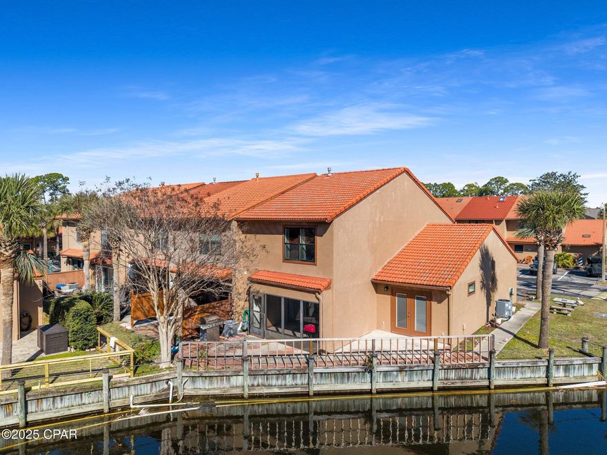 Rarely available and completely remodeled 3-bedroom, 3.5-bath townhome located in the popular Gulf Highlands Beach Resort. Each bedroom features its own en-suite bath, providing comfort and privacy for family and guests. This versatile layout comfortably sleeps up to 10 people and includes a ground-floor suite that can serve as a private ''Mother-in-Law'' or efficiency unit with its own entrance and patio.

Enjoy canal views right from your patio—perfect for fishing or grilling outdoors. Interior upgrades include a brand-new kitchen, updated flooring, modern bathroom cabinets and fixtures, new water heater, new ground-floor AC unit with dual-zone system, and a new storm door.

Gulf Highlands offers exceptional amenities: a Gulf-front clubhouse and pool, 11 pools (5 heated), 4 tennis courts (2 lighted), shuffleboard, an 18-hole mini-golf course, and more. Conveniently located just a short walk to the beautiful white-sand beaches of the Gulf of Mexico, with three assigned parking spaces right outside your door.

A rare opportunity to own a move-in-ready home or short-term rental in one of Panama City Beach's most desirable gated communities.

All measurements are approximate; please verify if important.