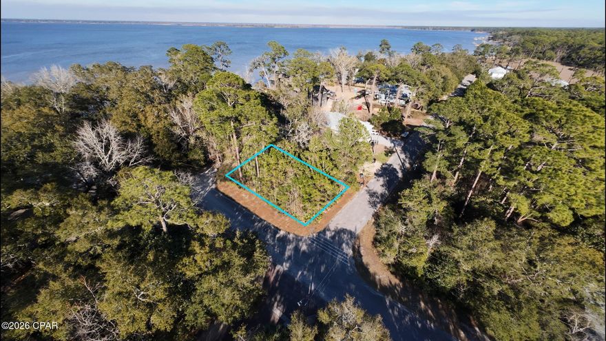 Tucked away in the charming coastal community of Magnolia Beach, this vacant homesite offers the perfect opportunity to create your ideal retreat along the beautiful Choctawhatchee Bay. Just moments from bay access, this no HOA property invites you to embrace a lifestyle centered around water, nature, and relaxed coastal living.

Enjoy convenient access to Point Washington Landing, approximately 4 miles away, where you can launch a kayak, paddleboard, or boat and spend your days exploring the bay. The sugar-white sands of Panama City Beach are just a short 15-20 minute drive, offering the perfect balance of peaceful ''Old Florida'' living and Gulf-front experiences.

You'll also be about 10 minutes from local dining, shopping, and everyday essentials, and roughly 20-25 minutes to the scenic 30A communities, including Seaside, Grayton, and Rosemary Beach--giving you easy access to some of the area's most beloved coastal towns while still enjoying the quiet charm of Magnolia Beach.

Zoned for Small Neighborhood/Residential, this property provides flexibility for a primary residence, second home, or investment opportunity in a steadily growing area.

Whether it's mornings on the water, afternoons spent exploring the bay, or unwinding with stunning sunset views, this homesite offers a chance to create a lifestyle that truly embraces coastal living.