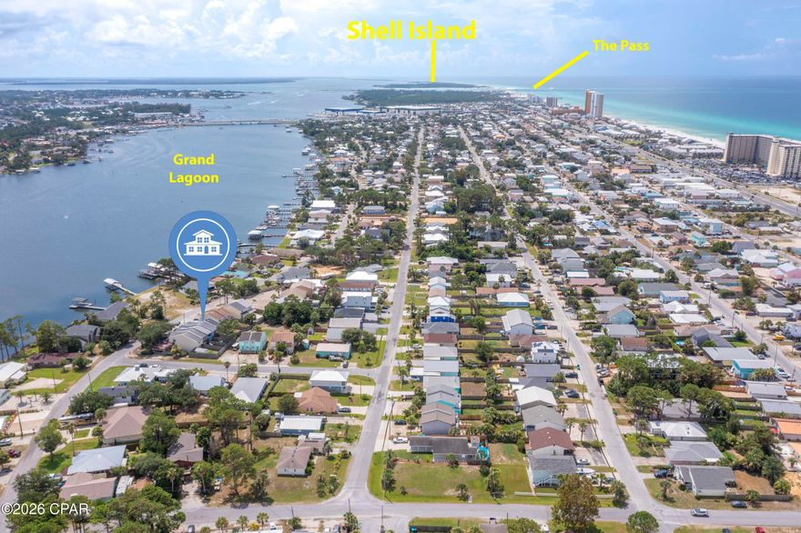 looking for a Beautiful two bedroom 2 full bath home with lagoon views from the balcony ? You found it! This beach bungelow is across the street from lagoon and a couple  blocks to the sandy white beaches of the Gulf. Large and roomy at over 1400 square foot this home is set up for comfort and privacy both with one large bedroom on each level with a full bath on each level as well. Large walk in closet and extra storage space under the stairs which would make a great lock out room for Short term rentals . No Hoa and short term allowed in this golf cart friendly neightborhood . Public boat ramp is less then a block away.  The location is Great! ,  close to all the local pubs , restrauants , shopping and more. 2 balconys and a cozy back yard make this the perfect beach spot to come home too after a day on the beach, lagoon or out boating! Call your favorite Realtor today for a private tour.