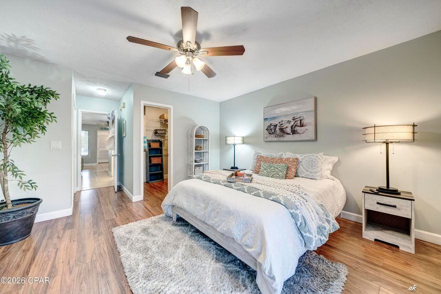 This spacious, 1,450-square-foot fully-furnished townhome, welcomes you with two large bedrooms, two full baths, and beautiful lagoon views!!

Upstairs, the expansive great room combines the large natural light filled kitchen and dining space, leading to a roomy deck overlooking the lagoon--the perfect spot for coffee and sunrises. A second bedroom in the back includes its own slider door, private deck, and closet, with easy access to another full bathroom. The large primary bedroom downstairs includes French doors and a private deck that flows out to a fenced-in backyard. Under the stairway, you'll find a large storage or ''lock-out'' room--perfect for beach gear and fishing rods, or for securing personal items, if used as a short-term rental.

This home is located in a neighborhood that boasts NO HOA fees. Short-term rentals are also welcome in this neighborhood. Golf Cart Friendly Neighborhood close to public boat ramps as well as local restaurants and pubs.  Along with the beautiful aesthetics of this townhome, a new Roof was installed in 2020 and a new HVAC system in 2023.  Owners have moved out of the area and have said - Bring them any offer!!  Don't miss out on this charming property. Call your favorite realtor for your private tour today!