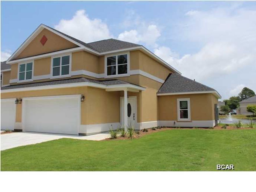 Welcome To Annabella's...An Affordable, Established Gated Townhome Community, Thoughtfully Located on Back Beach Road Just West of Hathaway Bridge and Sugar White Beaches Nearby. Nestled in a Resort-Like Setting, Each Residence Enjoys Subtle Hints of Southern Charm, Spacious Greenbelt Views, Along With Access to a Private Swimming Pool and Clubhouse with Fitness Center. Offering Brand New Construction at Affordable Pricing. This Four Bedroom, Three Full Bath Residence Features Open Floor Plan, Tile Flooring in the Main Living Areas, 9' ft Ceilings On 1st Floor, Kitchen with Breakfast Bar and Stainless Steel Appliances, Granite Countertops Through Out, 1st Floor & 2nd Floor Master Suites, 2nd Floor Laundry, 2 Car Attached Garage, Maintenance Free Living