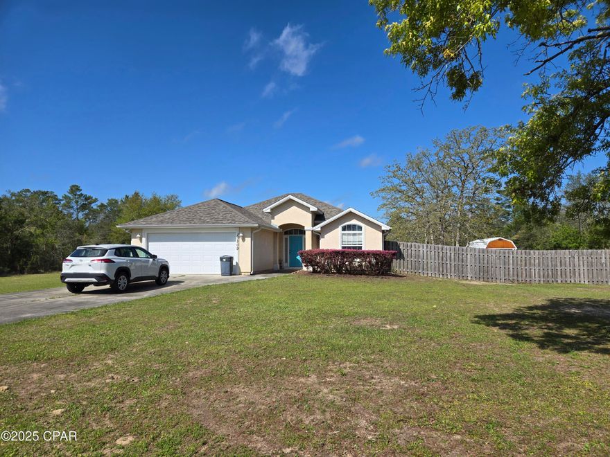 OPEN HOUSE TODAY FROM 4-6 PM!
3% military connected assumable VA loan!  Survey & wind mit available! 
NEW roof, NEW carpet in the bedrooms, NEW HVAC in April 2024 & a NEW water heater! Comes with washer/dryer, all the kitchen appliances, 3 wall mounted TVs & a riding lawn mower!
Welcome Home to the Woodcrest Community in the Sandhills!  
This charming cottage style home has 4 bedrooms & 2 bathrooms, with an open floor plan & an acre of open land for you to create your own oasis! A brand-new roof in Dec 2024 gives you peace of mind that your home is protected! A large shed out back provides additional storage space for all your gardening tools.  Ample parking for all your outdoor toys like boats, ATVs, trailers & campers! There's even a fire pit out back for roasting marshmallows or singing campfire songs! With monthly food trucks in the neighborhood & a private Facebook group dedicated to our neighborhood - there is a spirit of camaraderie! And there's space here - no zero lot lines or restrictive HOAs! Tucked away from the highway, but a straight shot into Lynn Haven & Panama City just across the Bailey Bridge! Far enough away to be county, but close enough to be convenient!