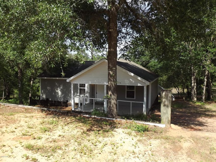 What a Great Little get away, This is a cute little lake cottage with water frontage on Grassy Pond.  It has 3.1 wooded acres with a large concrete slab. with a little tree trimming there could be a great view of Grassy Pond. It is secluded and quiet offering wildlife, fishing and peace and quiet.  Home is in excellent condition a has all new appliances. All of you who want this quiet and peaceful life style, need to check this out.