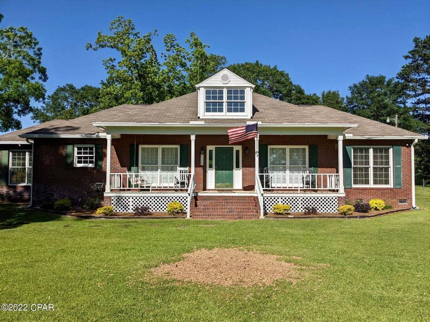 This three bedroom, two bathroom home is situated on a paved road just off of Orange Hill Road.  The living area is open to the dining room, as well as the galley style kitchen.  Home has a nice covered front porch and large back deck.