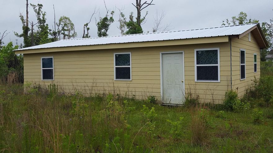 'CURRENTLY UNDER CONTRACT, SELLER ACCEPTING BACKUP OFFERS'PRICE REDUCTION! MOTIVATED SELLER!! HANDYMAN'S SPECIAL OR AN INVESTOR'S DELIGHT TO (RENT OR FLIP). This home is being sold ''As Is'' and has been partially restored since Hurricane Michael. The roof has been replaced with a new metal roof. The exterior siding and windows are also brand new. The walls inside the house are partially complete, but need to be finished, mudded, sanded and painted. There are also additional interior modifications needed. The flooring has linoleum that has not been completely glued down.  The location is close to restaurants, shopping and schools. All measurements are subject to verification.