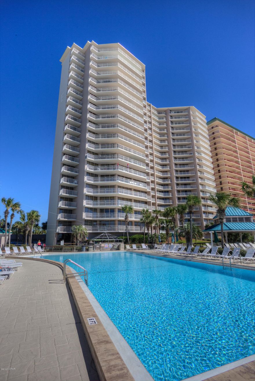 CURRENTLY UNDER CONTRACT, SELLER ACCEPTING BACKUP OFFERS' **'Gulf Front'**Beautiful Large 2BR/2BA  1286 sq.ft. Updated: New interior paint, all tile flooring, light fixtures, counters, cabinets, doors throughout, Tile showers in both bathrooms, crown molding, Kitchen w/breakfast bar and stainless steel appliances.  Wonderful Gulf Front views from Kitchen, Dining room, Master Bedroom and Living room. Large Balcony to relax and see what is going on at the beach and 1 of the 3 pools.  This is a wonderful rental investment or great second home. Dunes of Panama has 3 pools, tennis, shuffleboard, fitness room, snack shop and a place to grill. All dimensions are approx.