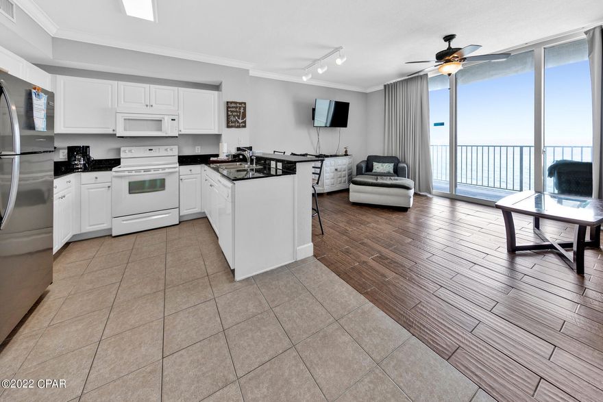 Beautiful 2 Bedroom, 3 Full Baths, plus a Bunk Room Condo on these Gorgeous White Sand Beaches!! One of the most sought-after ''M'' Floor plans in this great Tidewater Resort! The Six Floor is just right! Also comes with an outside storage room that you can store your beach toys in or use as an Owners Closet! Just 5 Minutes from Pier Park! The Resort's amenities include two large pools, indoor heated pool, fitness center with a spa, theater, conference center and a game room. Also a restaurant , Starbucks, ice cream shop and owner's lounge. If details are important, please verify.