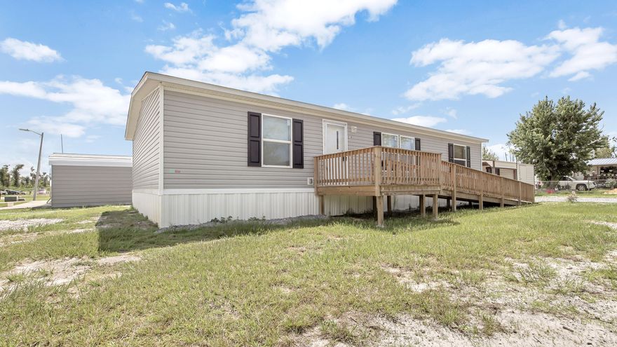 This 3 bedroom/ 2 bathroom double-wide TRU Mobile Home ''Satisfaction'' model is essentially brand-new, located on a cornerlot, offering plenty of opportunites for the new owner to make it their own. This model offers quality standard features such as solid steel foundation, reinforced vapor barrier, thick installation, and inter-locking/water-resilient flooring just to name a few. Kitchen appliances included along with smart Ecobee thermostat. Covered parking is offered with the large attached shed. There is minor damage on the backside of the shed, however, easy fix and still very much usable. Don't miss out on previewing this property today! All sizes/info/measurements approximate; please verify if important.