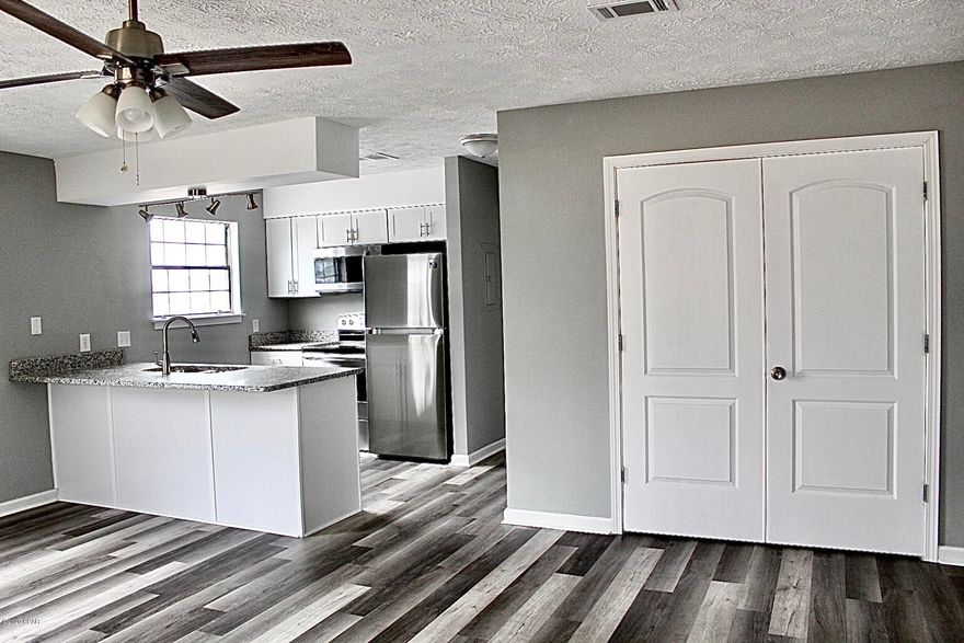 Newley remodeled 2BR/1BA condo. Luxury vinyl flooring throughout, brand new kitchen cabinets with stainless steel appliances and Granite countertops.  Greenwood estates is a wonderful Waterfront community, with accessible  boat launch, dock with lift , in ground pool, BBQ grilling area with a beautiful picnic gazebo. This unit does not have a boat slip.