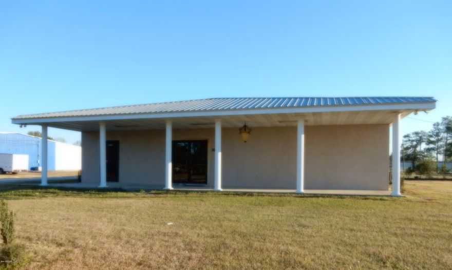 GREAT INVESTMENT OPPORTUNITY. PROPERTY HAS ENDLESS OPPORTUNITIES, INSIDE HAS BEEN DEMOLISHED TO JUST THE EXTERIOR WALLS. LOCATED JUST BEHIND MCDONALDS AND GREAT VISABILITY FROM HWY 77.
