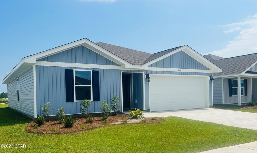 When you enter the Freeport floorplan through the prairie door you will notice immediately the brightness of the entry hallway. This 4 bedroom 2 bath, 1387 square foot, home is an open floorplan with two bedrooms separated by a full bathroom at the front of the home and one bedroom across the entry hallway affording family and friends alike privacy when visiting.  The large kitchen island overlooks the dining room and living room allowing all to be together or doing individual tasks in each area. The main areas of the home as well as the bathrooms and laundry have beautiful luxury vinyl plank while the bedrooms offer plush carpeting. Titus Park is in Panama City, Florida and is only minutes away from Tyndall Airforce Base! This large-scale multi-phase community is located off Highway 390 at Highway 231, centrally located for an abundance of shopping, restaurants, and great schools! Beautiful white sands beaches are just a short drive from your doorstep. Access the bay for fun and fishing by use of the public boat ramp only 3 miles away.  There will soon be a Publix shopping center across the street from the community entrance.  Titus Park highlights some of the most beautiful floorplans, which have amazing features.  We are building both our affordably priced Express Homes as well as our Traditional Series with upgraded finishes both inside and out. Contact a D.R. Horton Sales agent for more information on everything that Titus Park has to offer!