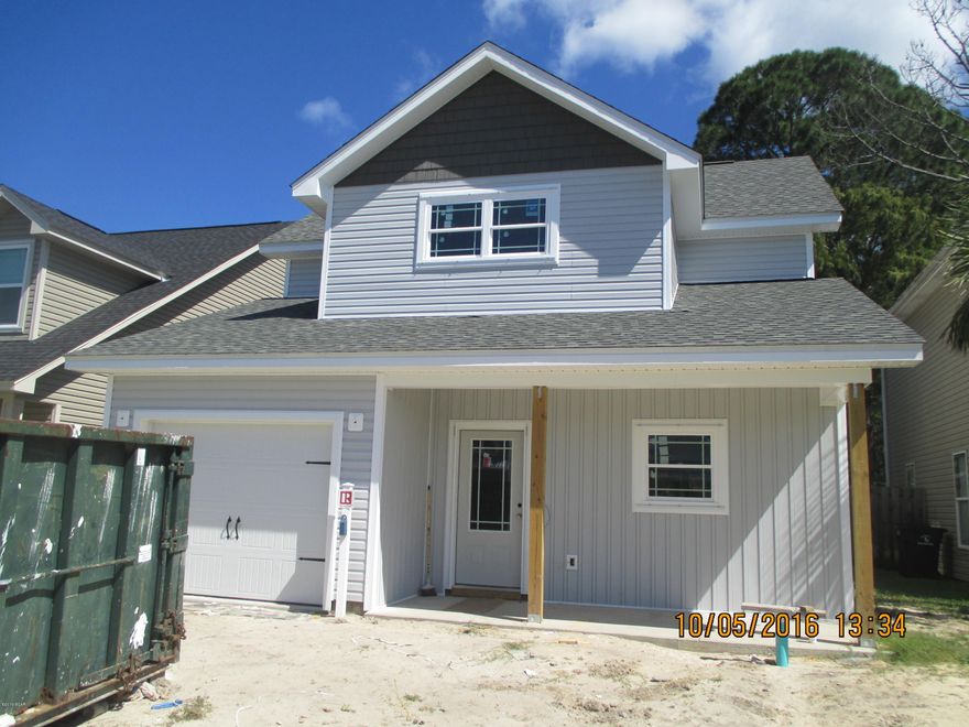 HOME FOR THE HOLIDAY! Move in this brand new home before the holiday season begins! This is a great floor plan featuring 4 bedrooms, 2 and 1/2 baths and a very open and spacious feel throughout. One of the upstairs bedrooms is really big and could be used as an office/playroom/media room. The other  bedrooms upstairs have large closets. The bath upstairs is big with double sinks and a linen closet. The master bedroom and bath are downstairs. The master bath has a separate tub and a tile shower.  The kitchen will feature granite counter tops, stainless appliances and custom cabinets. This is a such a cozy neighborhood on a dead-end street with not many homes, a pool, community room, street lights and very low association fees.