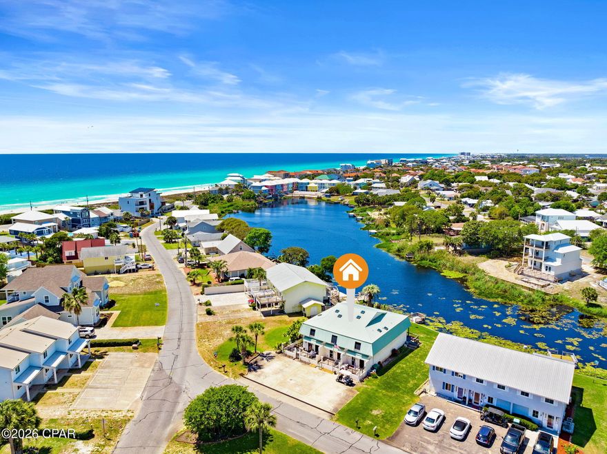 Waterfront Townhome, one block from the beach, is for sale in Panama City Beach, FL.  Ideally located on the highly desirable West End. This hidden gem offers stunning lake views and a short walk to the Gulf--where you'll enjoy a quieter, more undeveloped stretch of beach, away from the crowds.  Truly the best of both worlds!
This middle-unit townhome has been lovingly maintained as a family's second home for many years and is ready for its next chapter.  These townhomes seldom come up for sale!  
Situated in the sought-after Gulf Vista community, known for its walkability to the beach and underground utilities.  This property offers a rare advantage--no HOA. Even better, short-term rentals are allowed, making this an outstanding opportunity for a variety of buyers. The front patio offers space for socializing and additional storage, while the balcony provides the perfect backdrop for relaxing by the water.
MANY Upgrades over the past few years makes this cute coastal unit,  move in ready!