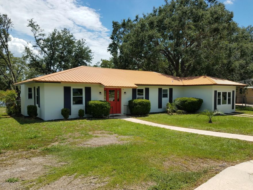 CURRENTLY UNDER CONTRACT, SELLER ACCEPTING BACKUP OFFERS. Jack & Jill plan on Watering Hole Lake cul de sac. Garage converted to large ''extra bedroom,'' office or den, plus inside storage and laundry room. Large, open, combined living/dining looks out through pair of new, double sliding glass doors to back porch and beautiful lake-view. New copper-colored roof, HVAC, HWH, windows, dishwasher, flooring, updated electric, kitchen and bathrooms. Very near popular Boat Lake Recreation swimming area as well as Sunny Hills Golf & Country Club. Easy drive to PC, PCB or Chipley. Come see for yourself!