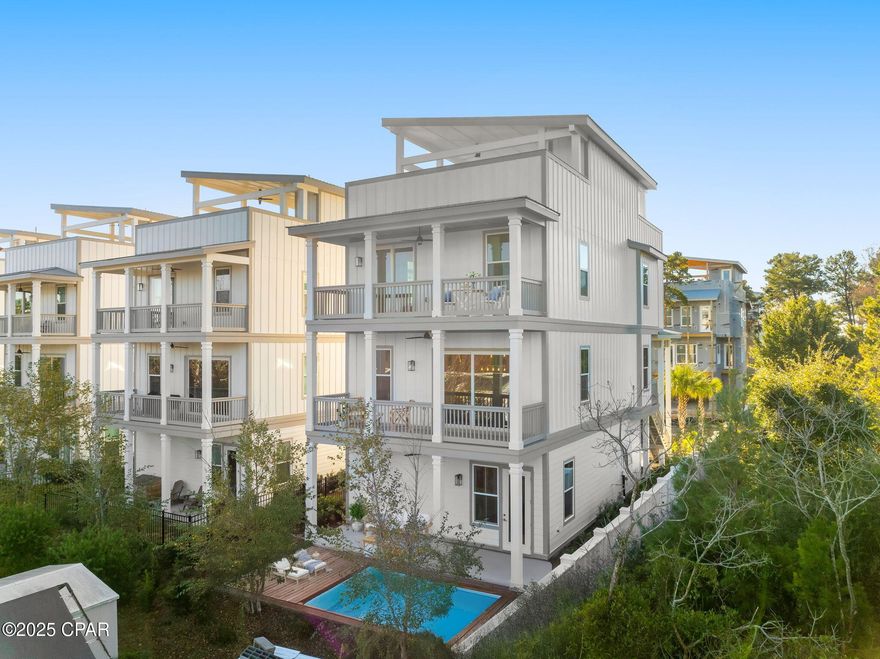 Welcome to 28 W Queen Palm Drive. A Great Turn-Key Rental Investment with Close Proximity to The Sugar White Sand Beaches of The Beautiful Emerald Coast. Located next door to all the shops and restaurants of 30Avenue. This brand new four-story home is a stunning coastal gem just a short walk to the beach, crowned by an expansive rooftop terrace with ocean views.  Coastal modern design with fine finishes throughout. Fully Furnished and Ready to Rent.  *This Homesite allows for a small dip pool. The Main floor features a spacious open concept kitchen and living area perfect for entertaining. The third floor has two guest suites with one room featuring bunk-beds and laundry room. Steps from the community pool and pavilion. The property benefits from convenient access to the underground tunnel connecting Twin Palms to iconic 30A destinations like 30Ave, Rosemary Beach, Alys Beach, and Inlet Beach Public Beach Access.