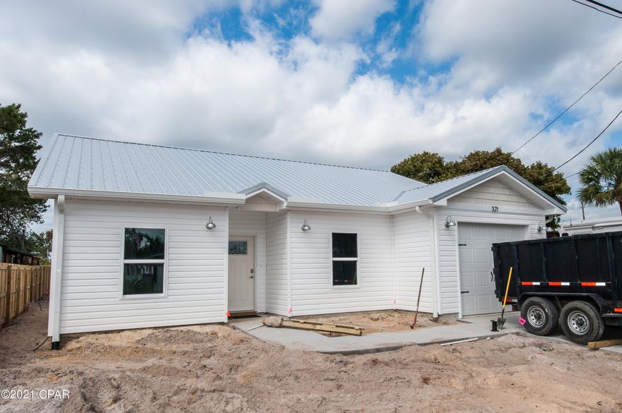 NEW CONSTRUCTION in a magnificent West End location! Smell the salt air as you step out of your front door for your five minute walk to the white sandy beach! Your beautiful new Beach House is nestled in a quiet golf-cart friendly neighborhood on the far West End, only 2.5 blocks off the beach, 5 minutes away from 2 large grocery stores and 7 minutes away from Highway 30A! Step inside and marvel at the high ceilings and beautiful luxury plank floors! The lighting, color palette, finishes and fixtures have been professionally chosen for that perfect Beach House look and feel! The chef will love the beautiful kitchen with soft-close Shaker cabinets, granite countertops, and stainless steel appliances. The large master bedroom has high ceilings and a huge master closet, and the master bath features double vanities and a lovely shower with floor to ceiling tile and a custom glass door! Smart Home features are modern and energy efficient LED lighting throughout, WiFi enabled garage door opener, WiFi enabled thermostat, and WiFi enabled irrigation! Designer interior colors, a garage, fully sodded and irrigated lot, and a beautiful patio in the backyard for grilling and entertaining! The lot is fully privacy fenced and there is plenty of room in the backyard for a swimming pool. Short term rentals ARE allowed. Construction is almost complete and this wonderful beach home is ready for you to call home!
