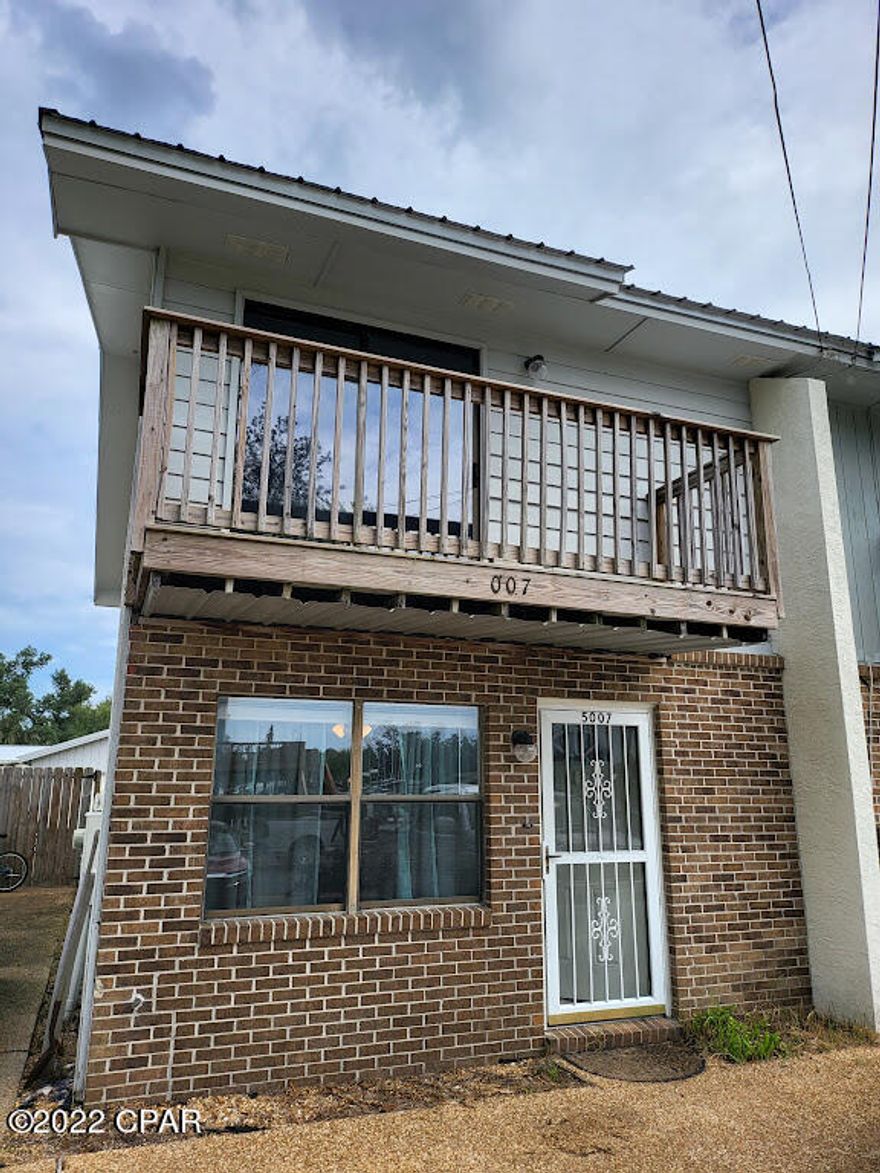 Public Notes: Investment opportunity!! 2 bdrm, 2.5 bath, 1120 sq/ft townhome, metal roof, large U-shaped lot, outbuilding, water views and close to Tyndall!! Great rental, STR, or first-time home buyer!! This will not last!!
