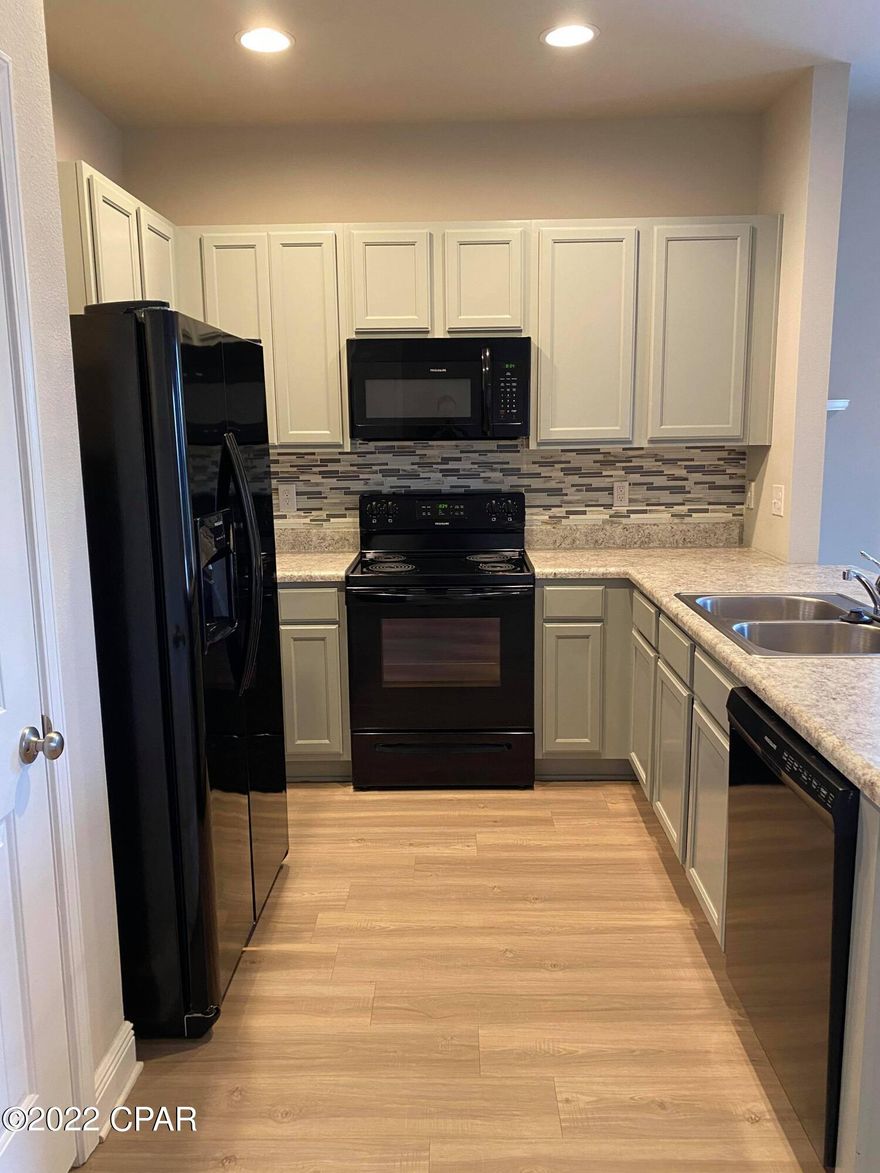 CURRENTLY UNDER CONTRACT, SELLER ACCEPTING BACKUP OFFERS

Great townhome and extra privacy being an end unit! This 3br 2.5 bath unit backs to the private wooded area. Community has a pool, picnic area and common area for your furry family member or for gathering with others. close to shopping and Tyndall AFB.