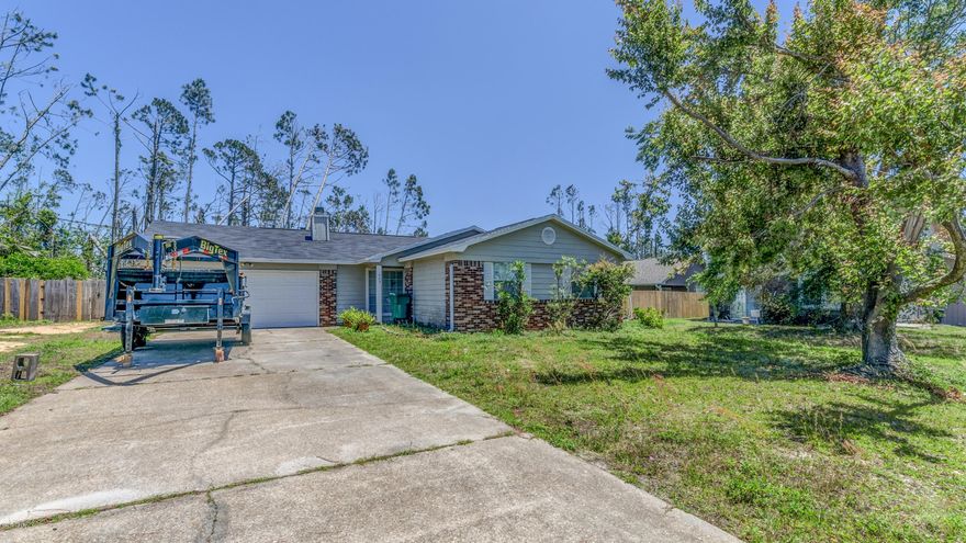 GREAT for 'first-time buyer' or investment property just minutes away from Tyndall AFB! This 3bd/2bth home tucked away on a quiet street, features new interior paint, new interior doors & new vinyl flooring throughout. Large, partially fenced backyard includes shed (shed is structurally sound, however, windows are in need of repair). New roof will be installed and should be completed within the next 30 days. Schedule your showing today! All sizes/info/measurements approx; please verify if important!