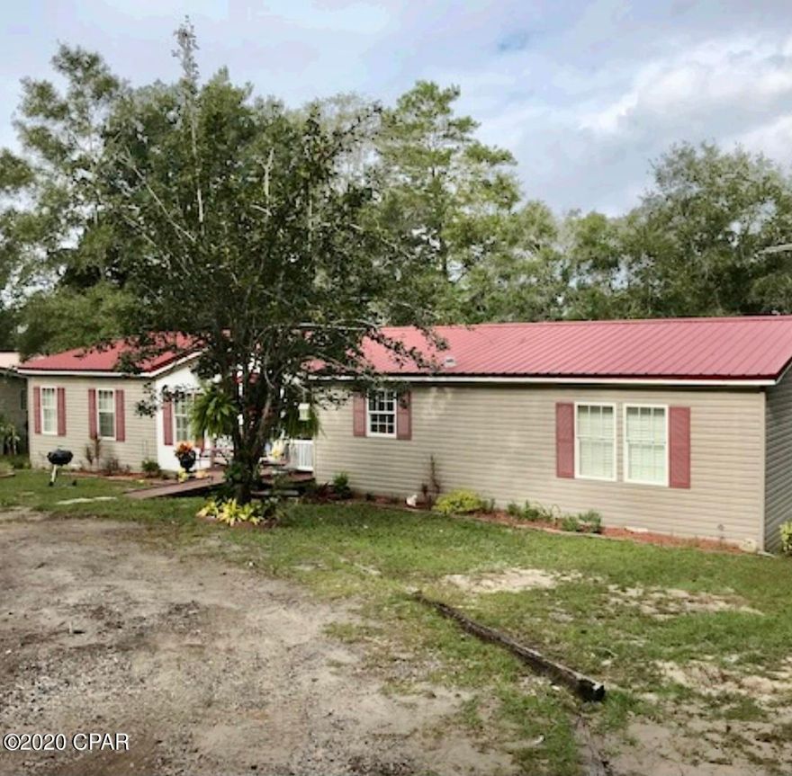 Well maintained double wide mobile home on Lake Suzanne in Leisure Lakes. Entered for comp purposes only.