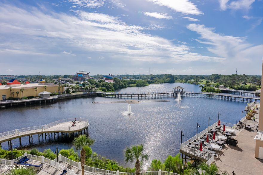 'CURRENTLY UNDER CONTRACT, SELLER WILL CONSIDER BACKUP OFFERS' ~ What a Great Deal on a 3 BR with 3 Baths located right across the street from THE BEACH.  The Main Bedroom has a very large Private Bathroom and a Walk-in Closet PLUS a Balcony overlooking the Pond & Dining. There is also an area to add Bunk Beds or use the area as an Office Space. The Kitchen Appliances are all new in Sept '22, the whole interior of the unit was just painted, all new Vinyl Plank Flooring, New Lights, New Ceiling Fans all in Sept '22. Age, SF, and Dimensions are approximate... please verify if Important.