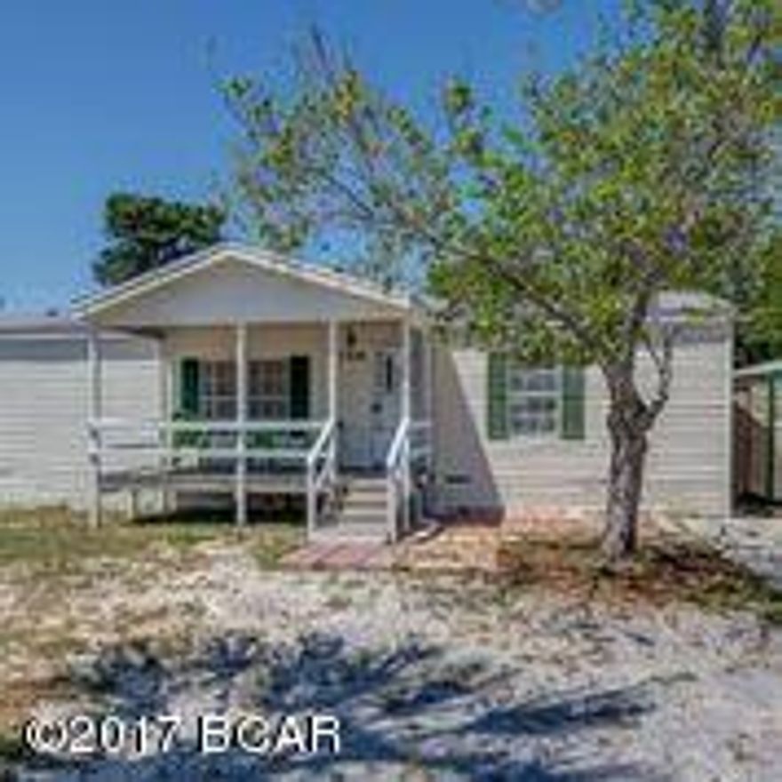 $10,000 PRICE ADJUSTMENT FROM $139,000 TO $129,000 

Huge! 4 bedroom - 3 bath beach home -  Close to Publix/WinnDixie. Beach, Lake Powell, 30A and Pier Park a short drive away. Great Family Beach Getaway! Recently renovated kitchen, done 3/15/17!. New carpet, new paint and beautiful new wood paneling in master bdrm. Includes washer/dryer/fridge, two outside storage buildings! Newer AC.