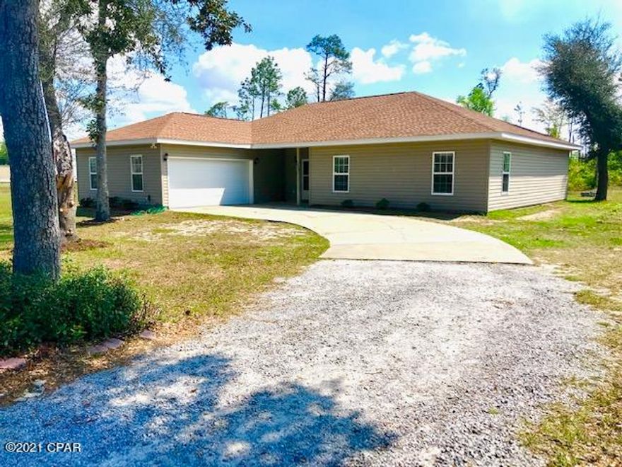 CURRENTLY UNDER CONTRACT, SELLER ACCEPTING BACKUP OFFERS. 8 MIN FROM TYNDALL AIR FORCE BASE! This well designed home was built in 2006 and boasts lots of open space inside & out. It has a huge living area. TONS of storage space. Walk in closet in the master bedroom. A bonus room that could serve as a computer room/office, or even an extra bedroom. The kitchen has stainless steel appliances and LOTS of cabinets! The open floor plan is perfect for entertaining! No HOA, so enjoy the firepit in the back yard with friends. The oversized garage is big enough for tool benches & shelves, or bikes & kayaks, or whatever hobby you may have. The roof was replaced after Hurricane Michael. The carpet in the two extra bedrooms is brand new. All information is approximate and should be verified by buyer if important.